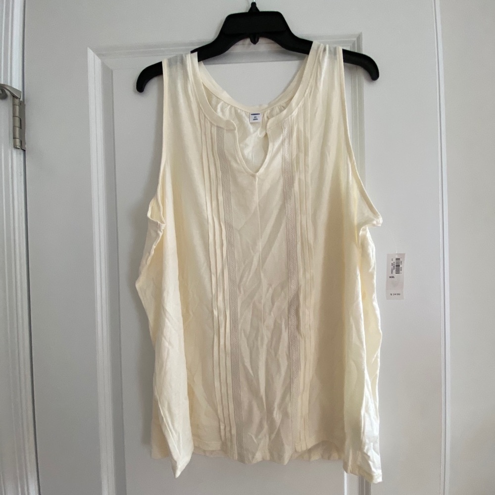 Laced cream tank